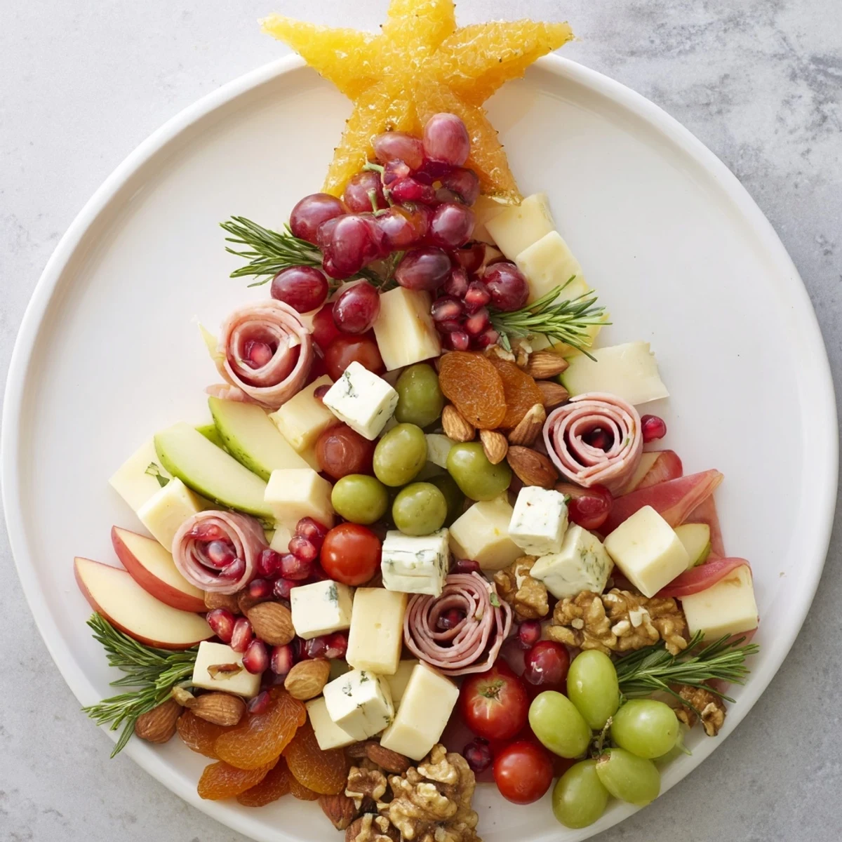 Festive Holiday Tree Appetizer Platter arranged with colorful cheeses, fruits, and meats, ready to wow guests.