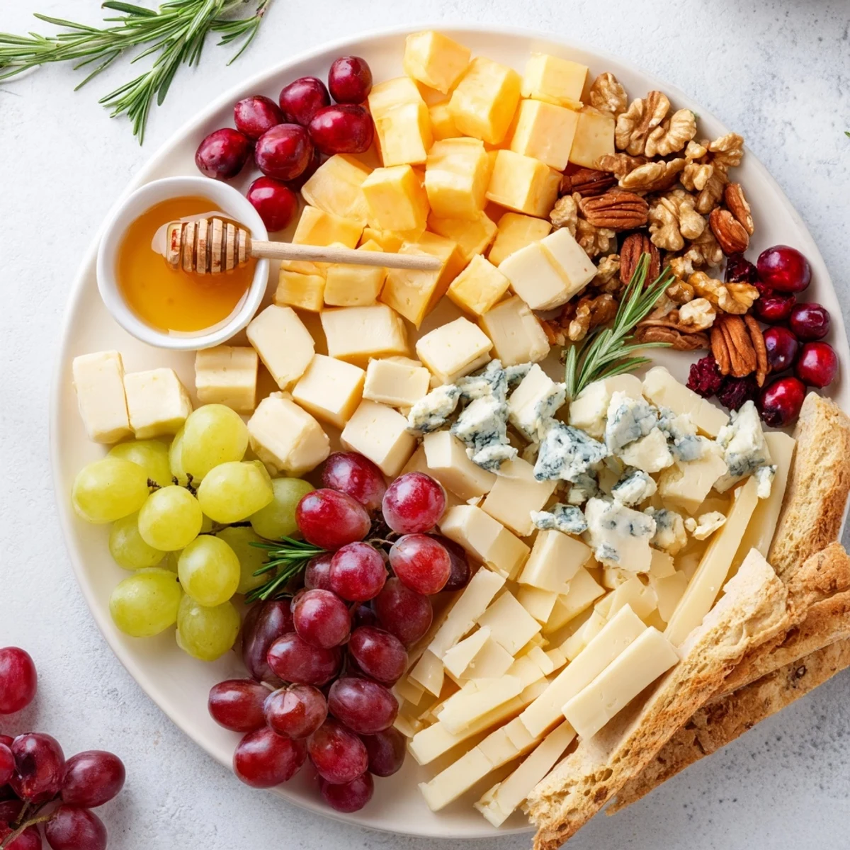 The appetizing Cranberry Grape Man Cheese Board features sharp cheddar, dried cranberries and crackers for easy snacking.