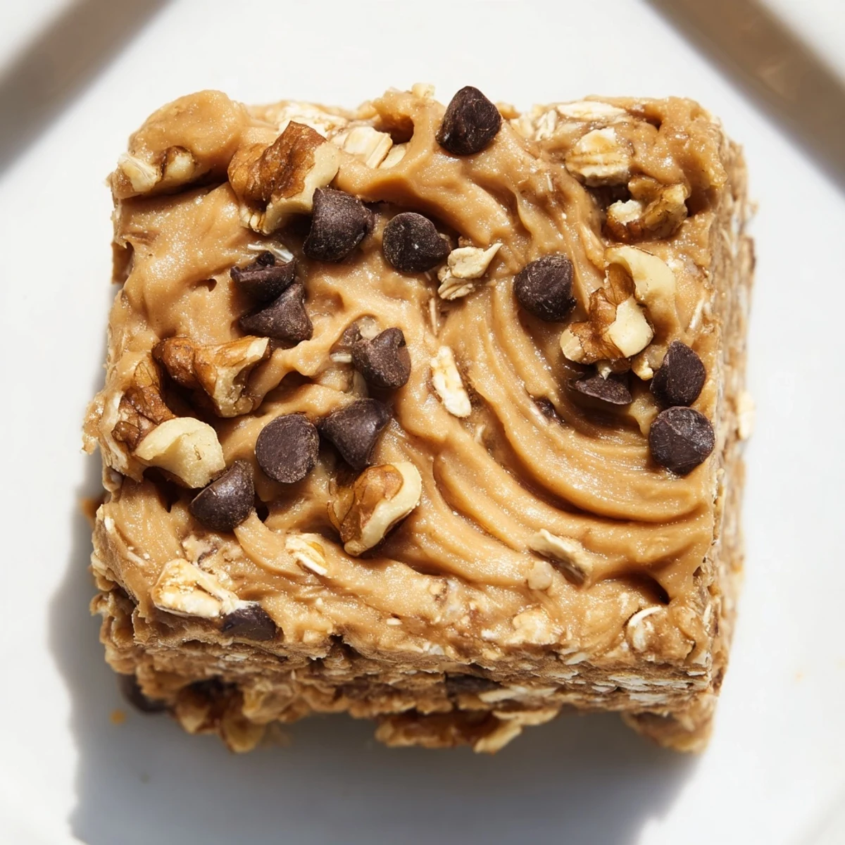Close-up of a Peanut Butter Banana Oat Bar, showcasing the creamy peanut butter and hearty oats.