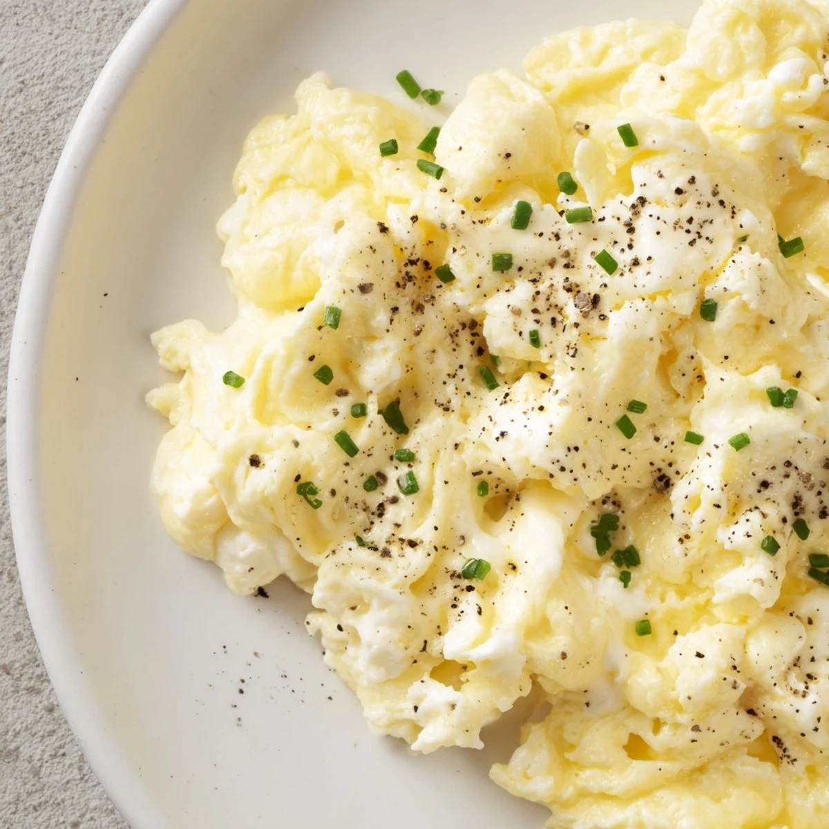 Fluffy cottage cheese scrambled eggs, golden and creamy, ready for a delicious protein-rich breakfast.