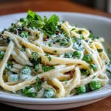 Bright Lemon Ricotta Pasta, featuring tender peas and a hint of zesty mint.