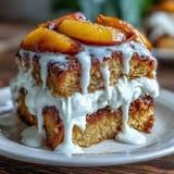 Summertime dessert: fluffy brown butter cornbread peach shortcake with dollops of whipped cream.