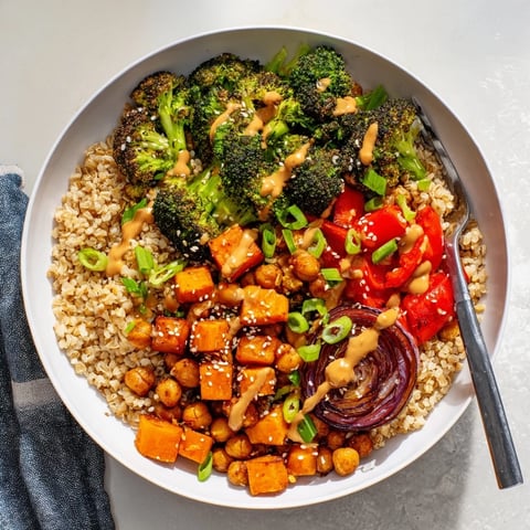 Vibrant Bold Sauce Drizzle Bowls topped with roasted veggies and creamy miso-butter sauce.  