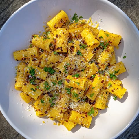 Golden, crispy Spicy Lemon-Parmesan Pasta Chips, brimming with zesty lemon flavor and savory Parmesan.