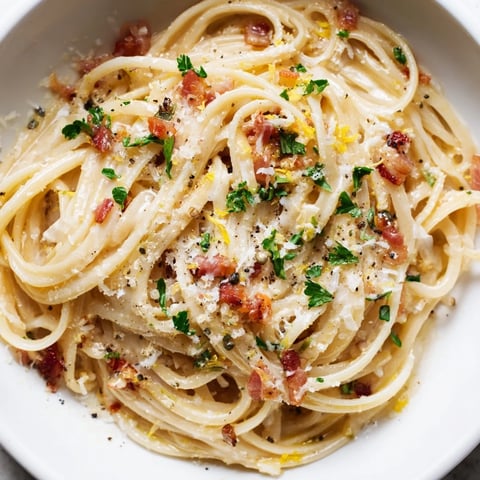 Golden-brown crispy bacon coats the perfectly cooked linguine in this flavorful, easy recipe.
