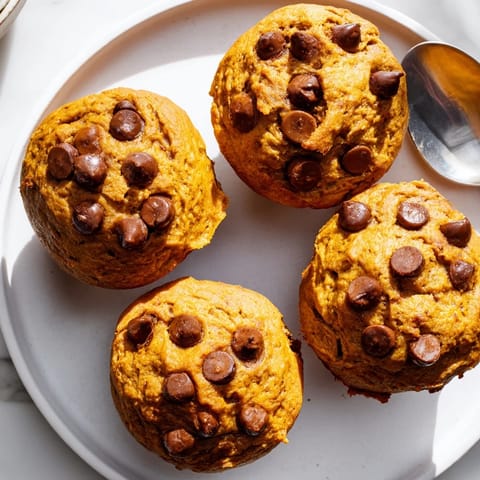 Deliciously moist vegan pumpkin chocolate chip muffin cookies perfect for cozy fall gatherings.  