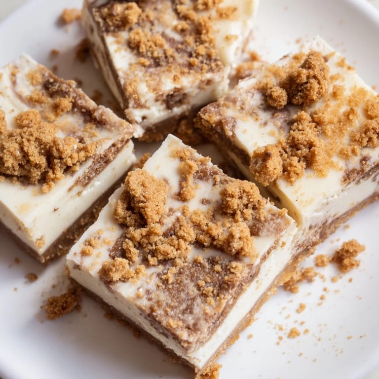 Delicious squares of Ginger Snap Cookie Chaos Fudge, blending creamy white chocolate and spice.