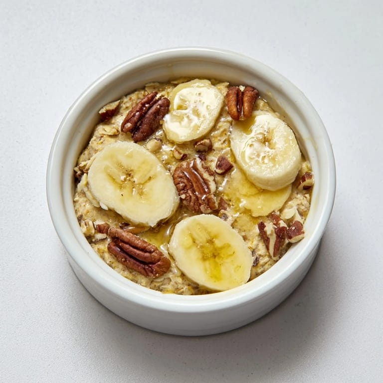 Close-up of Baked Oats Ramekins with Banana and Honey, a simple, delicious breakfast recipe.