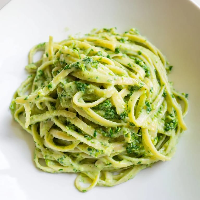 Creamy homemade Green Goddess Pasta Sauce boasts the bright flavors of fresh herbs and garlic.
