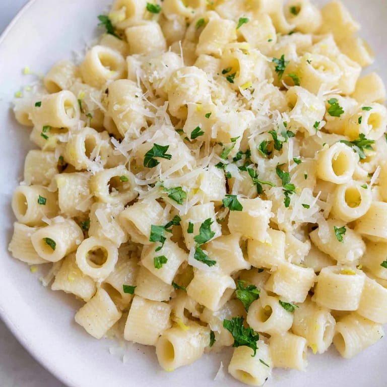 Enjoy a steaming bowl of 15-Minute Creamy Garlic Butter Ditalini, a quick and satisfying vegetarian meal idea.