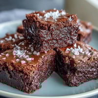 Rich, fudgy sourdough discard brownies topped with flaky sea salt, perfect for using up leftover starter.  